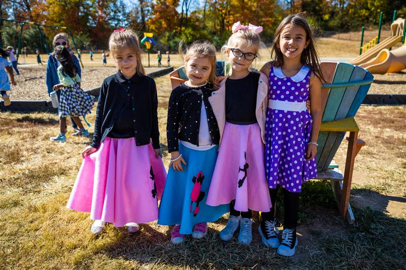 Students dressed in '50s wear smile